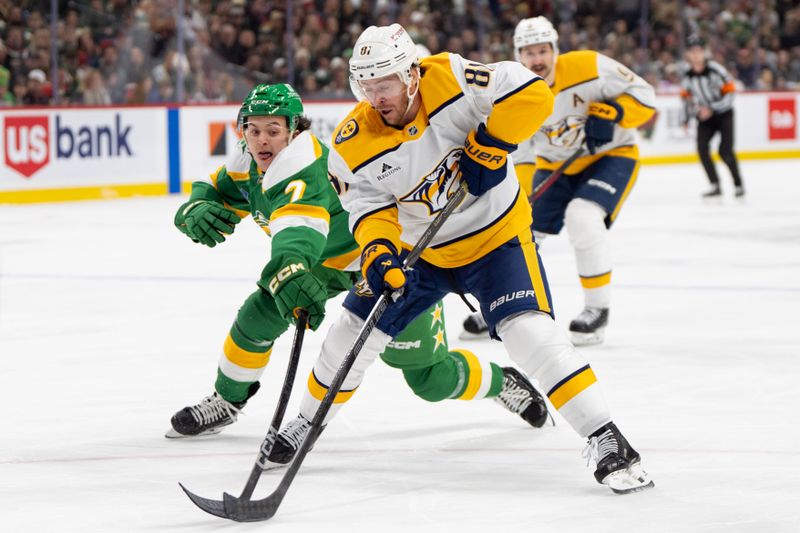 Dec 31, 2024; Saint Paul, Minnesota, USA; Minnesota Wild defenseman Brock Faber (7) defends Nashville Predators center Jonathan Marchessault (81) in the first period at Xcel Energy Center. Mandatory Credit: Matt Blewett-Imagn Images