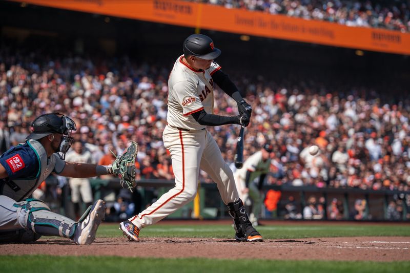 Apr 6, 2025; San Francisco, California, USA; San Francisco Giants first baseman Wilmer Flores (41) hits a RBI single to right field against the Seattle Mariners during the ninth inning at Oracle Park. Mandatory Credit: Neville E. Guard-Imagn Images