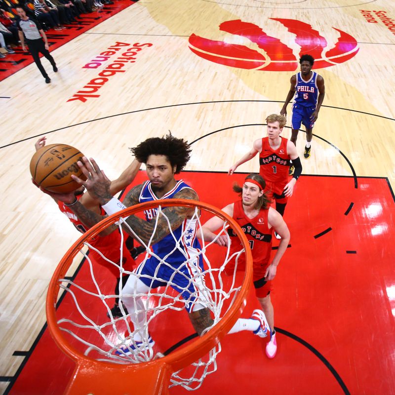 TORONTO, CANADA - MARCH 31: Kelly Oubre Jr. #9 of the Philadelphia 76ers drives to the basket during the game against the Toronto Raptors on March 31, 2024 at the Scotiabank Arena in Toronto, Ontario, Canada.  NOTE TO USER: User expressly acknowledges and agrees that, by downloading and or using this Photograph, user is consenting to the terms and conditions of the Getty Images License Agreement.  Mandatory Copyright Notice: Copyright 2024 NBAE (Photo by Vaughn Ridley/NBAE via Getty Images)