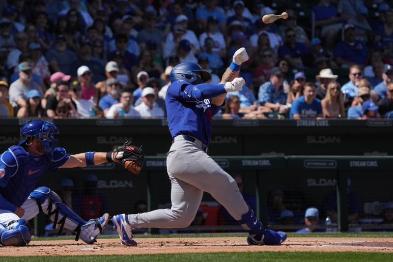 Mar 15, 2026; Mesa, Arizona, USA; Los Angeles Dodgers catcher Dalton Rushing (68) loses his bat against the Chicago Cubs in the first inning at Sloan Park. Mandatory Credit: Rick Scuteri-Imagn Images