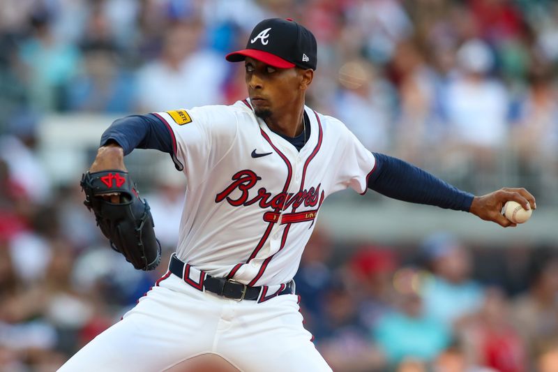 May 30, 2024; Atlanta, Georgia, USA; Atlanta Braves starting pitcher Ray Kerr (58) throws against the Washington Nationals in the first inning at Truist Park. Mandatory Credit: Brett Davis-USA TODAY Sports