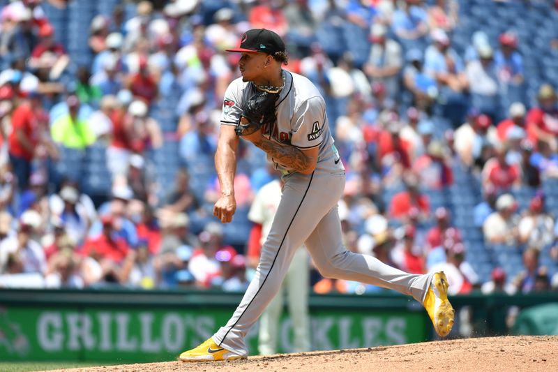 Jun 23, 2024; Philadelphia, Pennsylvania, USA; Arizona Diamondbacks pitcher Justin Martinez (63) throws a pitch against the Philadelphia Phillies at Citizens Bank Park. Mandatory Credit: Eric Hartline-USA TODAY Sports