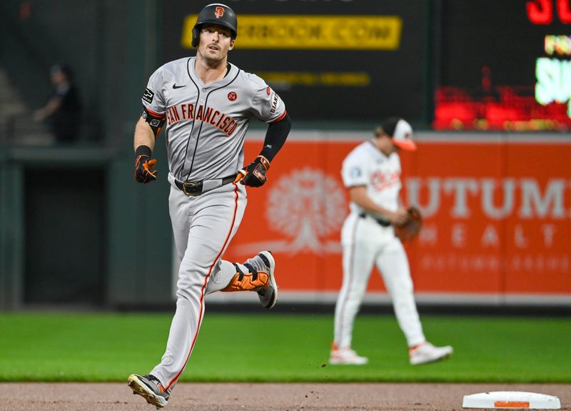 Sep 18, 2024; Baltimore, Maryland, USA;  San Francisco Giants outfielder Mike Yastrzemski (5) waves after hitting a lead off home run against the Baltimore Orioles at Oriole Park at Camden Yards. Mandatory Credit: Tommy Gilligan-Imagn Images
