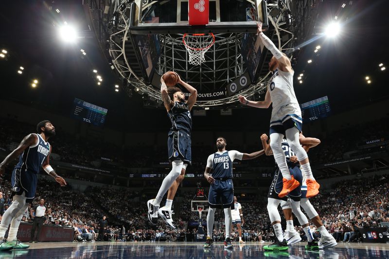 MINNEAPOLIS, MN -  OCTOBER 29: Dereck Lively II #2 of the Dallas Mavericks goes up for the rebound during the game against the Minnesota Timberwolves on October 29, 2024 at Target Center in Minneapolis, Minnesota. NOTE TO USER: User expressly acknowledges and agrees that, by downloading and or using this Photograph, user is consenting to the terms and conditions of the Getty Images License Agreement. Mandatory Copyright Notice: Copyright 2024 NBAE (Photo by David Sherman/NBAE via Getty Images)