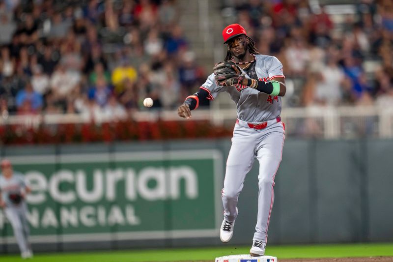 Sep 13, 2024; Minneapolis, Minnesota, USA; Cincinnati Reds shortstop Elly De La Cruz (44) forces out Minnesota Twins left fielder Willi Castro (not pictured) at second base and throws the ball to first base for a double play in the fifth inning at Target Field. Mandatory Credit: Jesse Johnson-Imagn Images