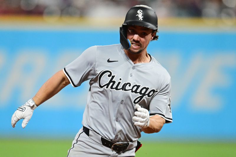 Apr 9, 2024; Cleveland, Ohio, USA; Chicago White Sox center fielder Dominic Fletcher (7) attempts to stretch a double into a triple during the eighth inning against the Cleveland Guardians at Progressive Field. Mandatory Credit: Ken Blaze-USA TODAY Sports
