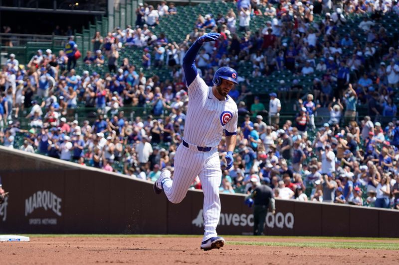 Aug 7, 2024; Chicago, Illinois, USA; Chicago Cubs first baseman Michael Busch (29) gestures after hitting a home run against the Minnesota Twins during the first inning at Wrigley Field. Mandatory Credit: David Banks-USA TODAY Sports
