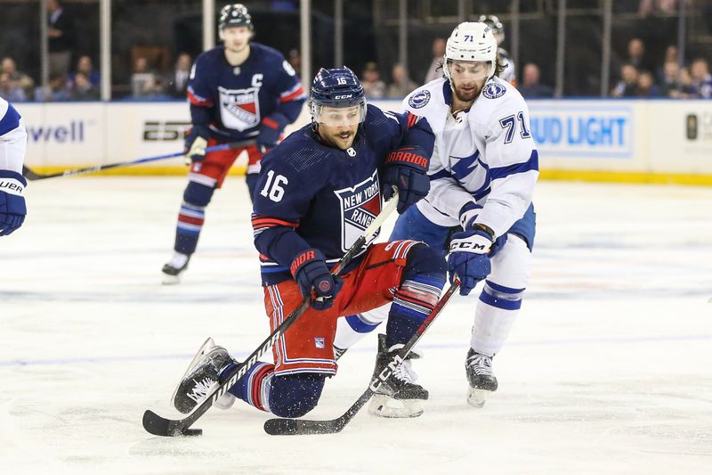 Feb 7, 2024; New York, New York, USA; New York Rangers center Vincent Trocheck (16) and Tampa Bay Lightning center Anthony Cirelli (71) battle for control of the puck in the second period at Madison Square Garden. Mandatory Credit: Wendell Cruz-USA TODAY Sports