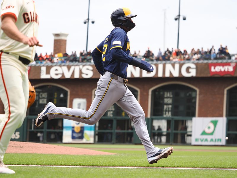 Apr 24, 2025; San Francisco, California, USA; Milwaukee Brewers second baseman Brice Turang (2) scores a run against San Francisco Giants starting pitcher Landen Roupp (65) during the first inning at Oracle Park. Mandatory Credit: Kelley L Cox-Imagn Images