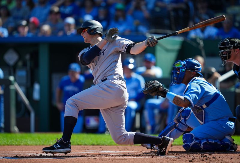 Oct 1, 2023; Kansas City, Missouri, USA; New York Yankees first baseman DJ LeMahieu (26) hits a single against the Kansas City Royals during the first inning at Kauffman Stadium. Mandatory Credit: Jay Biggerstaff-USA TODAY Sports