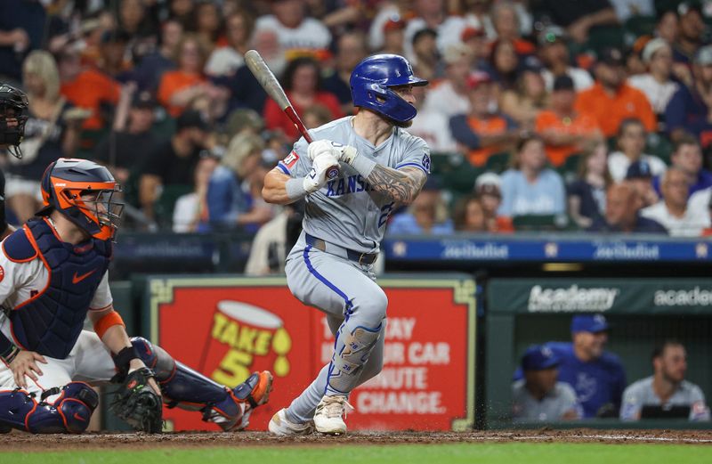 Aug 31, 2024; Houston, Texas, USA; Kansas City Royals center fielder Kyle Isbel (28) hits a single during the sixth inning against the Houston Astros at Minute Maid Park. Mandatory Credit: Troy Taormina-USA TODAY Sports