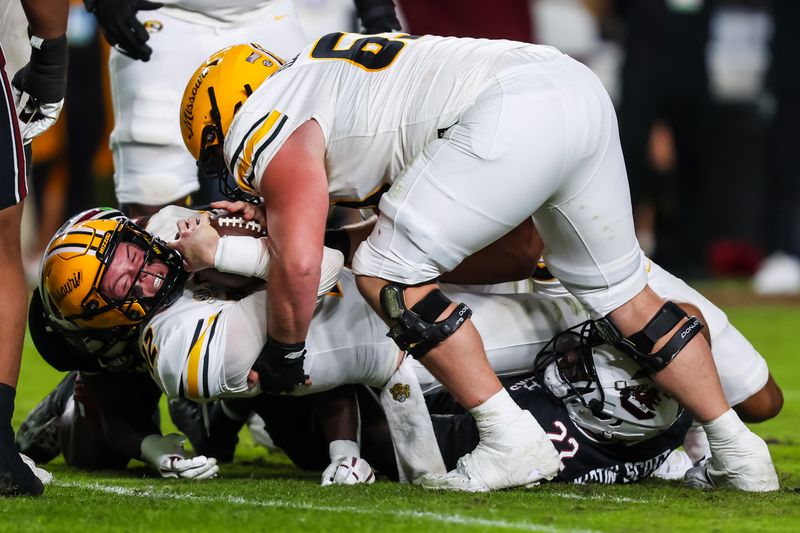 Nov 16, 2024; Columbia, South Carolina, USA; Missouri Tigers quarterback Brady Cook (12) is stopped by the South Carolina Gamecocks on a two-point conversion attempt in the second half at Williams-Brice Stadium. Mandatory Credit: Jeff Blake-Imagn Images