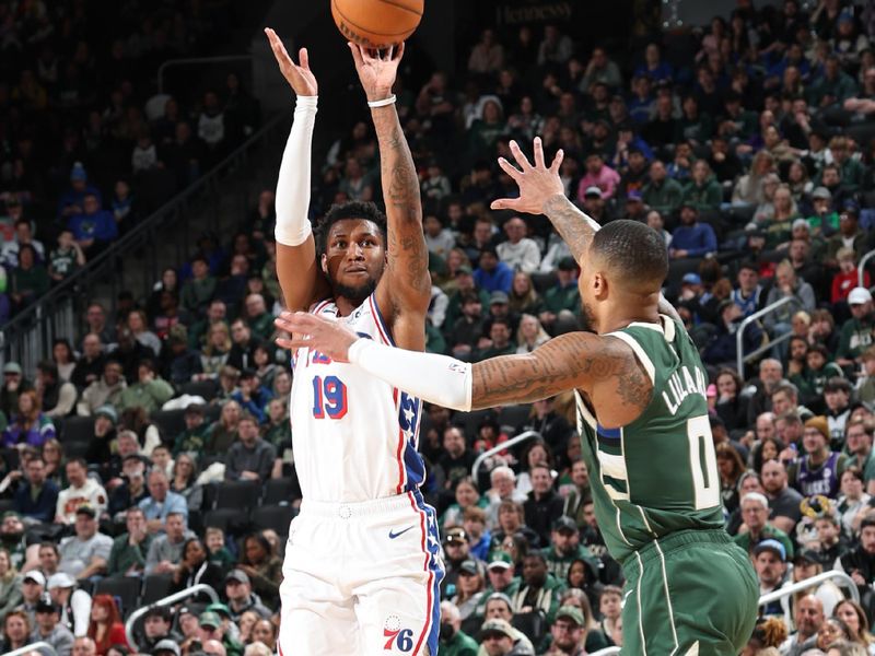 MILWAUKEE, WI - FEBRUARY 9:  Justin Edwards #19 of the Philadelphia 76ers shoots the ball during the game against the Milwaukee Bucks  on February  9, 2025 at Fiserv Forum Center in Milwaukee, Wisconsin. NOTE TO USER: User expressly acknowledges and agrees that, by downloading and or using this Photograph, user is consenting to the terms and conditions of the Getty Images License Agreement. Mandatory Copyright Notice: Copyright 2025 NBAE (Photo by Jeff Haynes/NBAE via Getty Images).