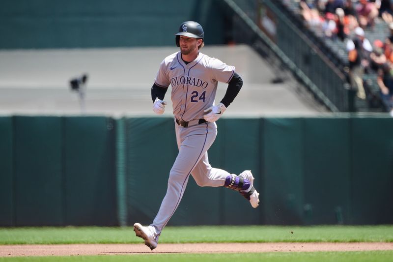 May 19, 2024; San Francisco, California, USA; Colorado Rockies infielder Ryan McMahon (24) runs the bases after hitting a one run home run against the San Francisco Giants during the first inning at Oracle Park. Mandatory Credit: Robert Edwards-USA TODAY Sports