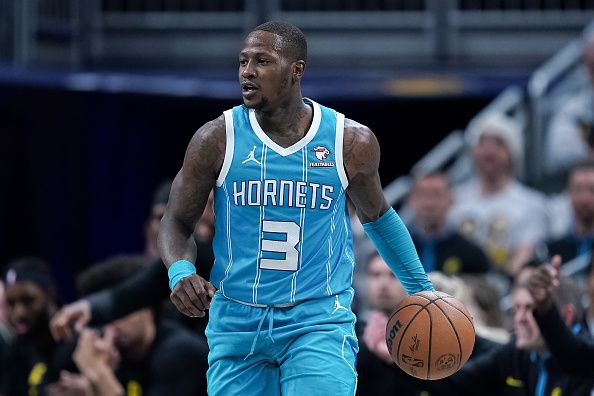 INDIANAPOLIS, INDIANA - DECEMBER 20: Terry Rozier #3 of the Charlotte Hornets dribbles the ball in the first quarter against the Indiana Pacers at Gainbridge Fieldhouse on December 20, 2023 in Indianapolis, Indiana. NOTE TO USER: User expressly acknowledges and agrees that, by downloading and or using this photograph, User is consenting to the terms and conditions of the Getty Images License Agreement. (Photo by Dylan Buell/Getty Images)