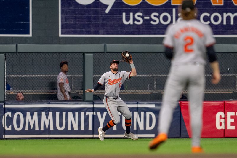 Sep 27, 2024; Minneapolis, Minnesota, USA; Baltimore Orioles left fielder Colton Cowser (17) catches a ball hit by Minnesota Twins designated hitter Ryan Jeffers (27) for the second out in the fifth inning at Target Field. Mandatory Credit: Matt Blewett-Imagn Images