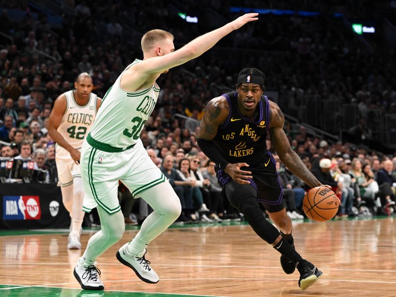 BOSTON, MASSACHUSETTS - FEBRUARY 01: Jarred Vanderbilt #2 of the Los Angeles Lakers drives to the basket against Sam Hauser #30 of the Boston Celtics during the first quarter at the TD Garden on February 01, 2024 in Boston, Massachusetts. NOTE TO USER: User expressly acknowledges and agrees that, by downloading and or using this photograph, User is consenting to the terms and conditions of the Getty Images License Agreement. (Photo by Brian Fluharty/Getty Images)