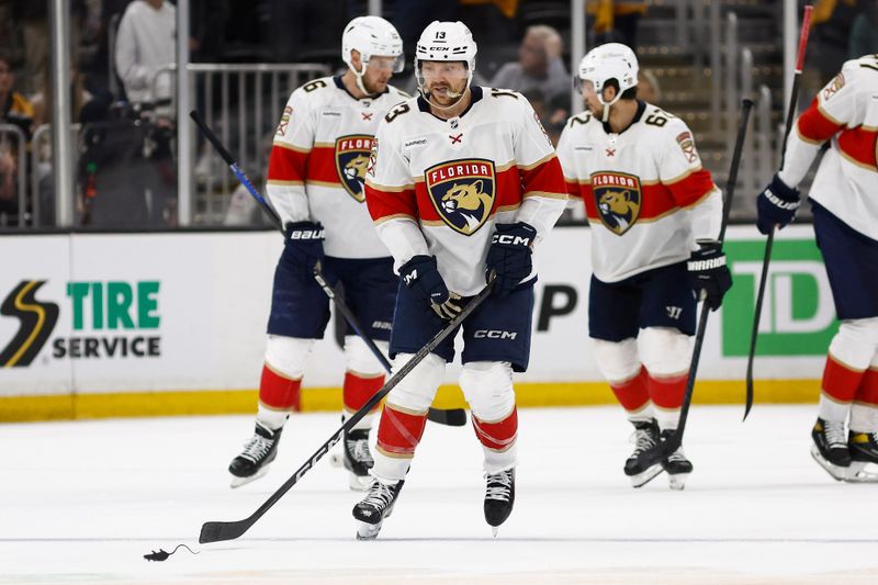 May 10, 2024; Boston, Massachusetts, USA; Florida Panthers center Sam Reinhart (13) goes to collect a rat after scoring against the Boston Bruins during the third period of game three of the second round of the 2024 Stanley Cup Playoffs at TD Garden. Mandatory Credit: Winslow Townson-USA TODAY Sports