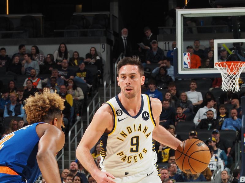 INDIANAPOLIS, IN - APRIL 5: T.J. McConnell #9 of the Indiana Pacers dribbles the ball during the game aNew York Knicks on April 5, 2023 at Gainbridge Fieldhouse in Indianapolis, Indiana. NOTE TO USER: User expressly acknowledges and agrees that, by downloading and or using this Photograph, user is consenting to the terms and conditions of the Getty Images License Agreement. Mandatory Copyright Notice: Copyright 2023 NBAE (Photo by Ron Hoskins/NBAE via Getty Images)