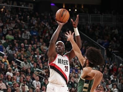 MILWAUKEE, WI - NOVEMBER 26: Duop Reath #26 of the Portland Trail Blazers shoots the ball during the game against the Milwaukee Bucks on November 26, 2023 at the Fiserv Forum Center in Milwaukee, Wisconsin. NOTE TO USER: User expressly acknowledges and agrees that, by downloading and or using this Photograph, user is consenting to the terms and conditions of the Getty Images License Agreement. Mandatory Copyright Notice: Copyright 2023 NBAE (Photo by Gary Dineen/NBAE via Getty Images).