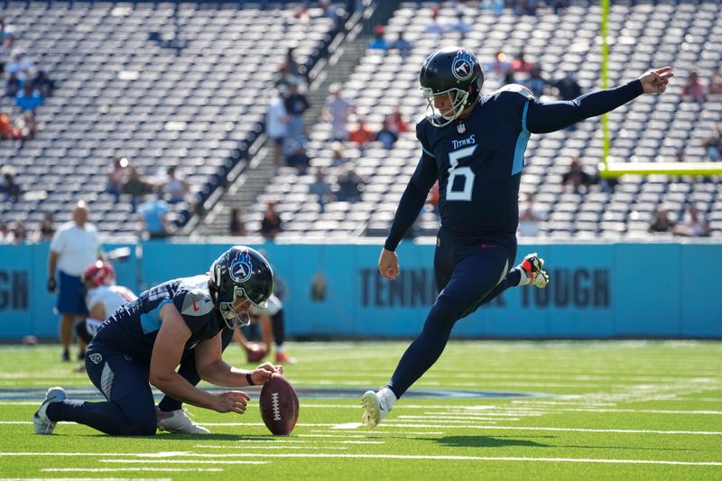 Tennessee Titans place kicker Nick Folk (6) warms up before an NFL football game between the Tennessee Titans and the Cincinnati Bengals, Sunday, Oct. 1, 2023, in Nashville, Tenn. (AP Photo/George Walker IV)