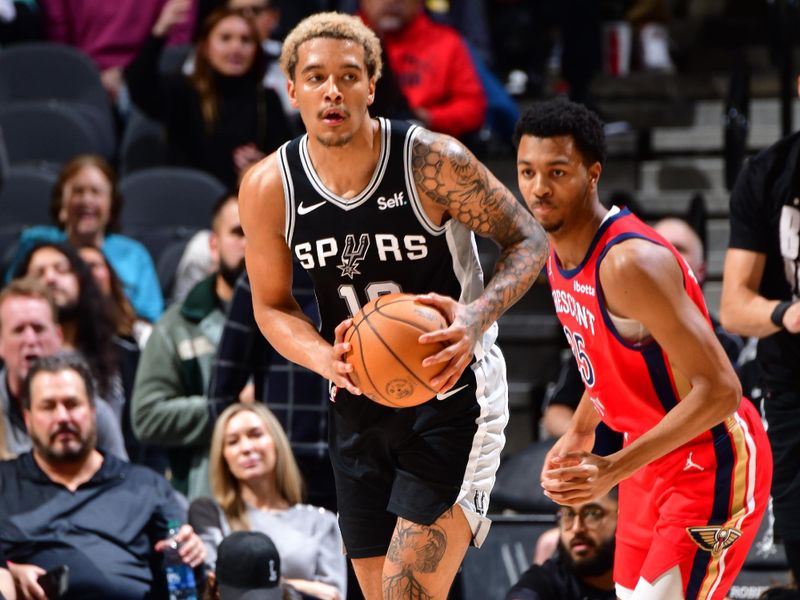 SAN ANTONIO, TX - FEBRUARY 2: Jeremy Sochan #10 of the San Antonio Spurs handles the ball during the game against the New Orleans Pelicans on February 2, 2024 at the Frost Bank Center in San Antonio, Texas. NOTE TO USER: User expressly acknowledges and agrees that, by downloading and or using this photograph, user is consenting to the terms and conditions of the Getty Images License Agreement. Mandatory Copyright Notice: Copyright 2024 NBAE (Photos by Barry Gossage/NBAE via Getty Images)