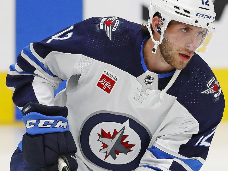 Sep 25, 2022; Edmonton, Alberta, CAN; Winnipeg Jets forward Jansen Harkins (12) skates during warmup against the Edmonton Oilers at Rogers Place. Mandatory Credit: Perry Nelson-USA TODAY Sports