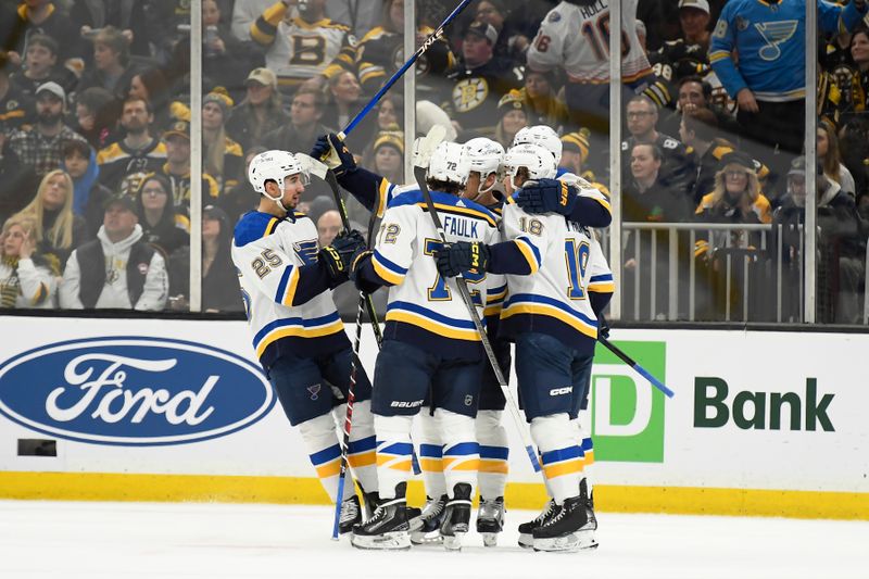 Mar 11, 2024; Boston, Massachusetts, USA;  St. Louis Blues center Robert Thomas (18) celebrates his goal with his teammates during the first period against the Boston Bruins at TD Garden. Mandatory Credit: Bob DeChiara-USA TODAY Sports