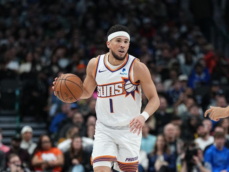 DALLAS, TX - JANUARY 24: Devin Booker #1 of the Phoenix Suns handles the ball during the game against the Dallas Mavericks on January 24, 2024 at the American Airlines Center in Dallas, Texas. NOTE TO USER: User expressly acknowledges and agrees that, by downloading and or using this photograph, User is consenting to the terms and conditions of the Getty Images License Agreement. Mandatory Copyright Notice: Copyright 2024 NBAE (Photo by Glenn James/NBAE via Getty Images)