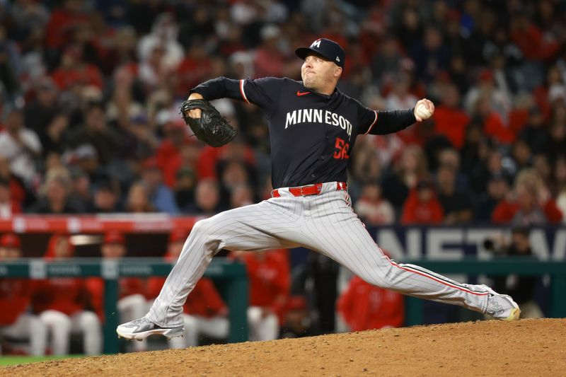 Apr 26, 2024; Anaheim, California, USA;  Minnesota Twins pitcher Caleb Thielbar (56) pitches during the ninth inning against the Los Angeles Angels at Angel Stadium. Mandatory Credit: Kiyoshi Mio-USA TODAY Sports