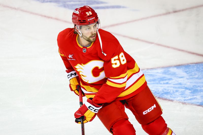 Oct 15, 2024; Calgary, Alberta, CAN; Calgary Flames center Justin Kirkland (58) skates during the warmup period against the Chicago Blackhawks at Scotiabank Saddledome. Mandatory Credit: Sergei Belski-Imagn Images