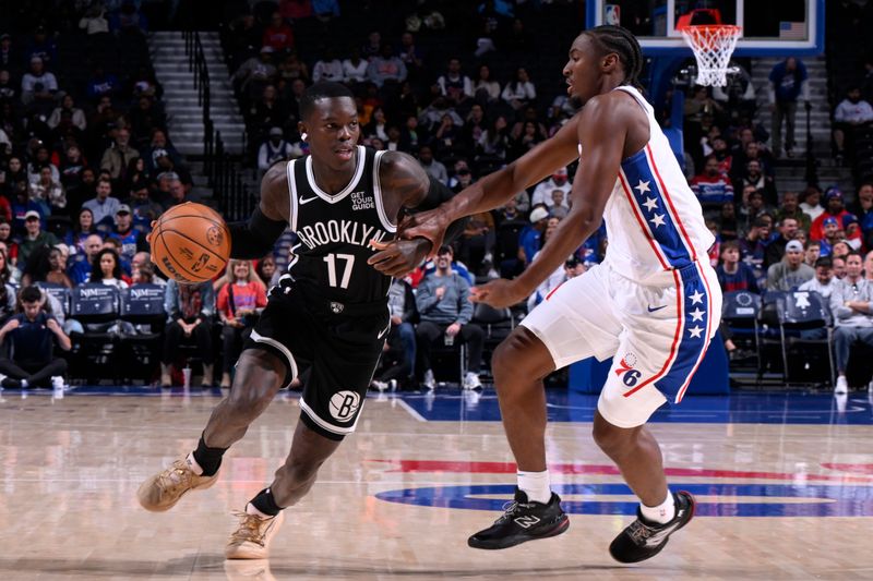 PHILADELPHIA, PA - OCTOBER 16:  Dennis Schroder #17 of the Brooklyn Nets dribbles the ball during the game against the 76ers on October 16, 2024 at the Wells Fargo Center in Philadelphia, Pennsylvania NOTE TO USER: User expressly acknowledges and agrees that, by downloading and/or using this Photograph, user is consenting to the terms and conditions of the Getty Images License Agreement. Mandatory Copyright Notice: Copyright 2024 NBAE (Photo by David Dow/NBAE via Getty Images)