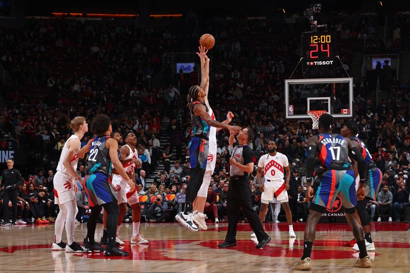 TORONTO, CANADA - MARCH 25: Tip-off during the game between the Brooklyn Nets and the Toronto Raptors on March 25, 2024 at the Scotiabank Arena in Toronto, Ontario, Canada.  NOTE TO USER: User expressly acknowledges and agrees that, by downloading and or using this Photograph, user is consenting to the terms and conditions of the Getty Images License Agreement.  Mandatory Copyright Notice: Copyright 2024 NBAE (Photo by Vaughn Ridley/NBAE via Getty Images)