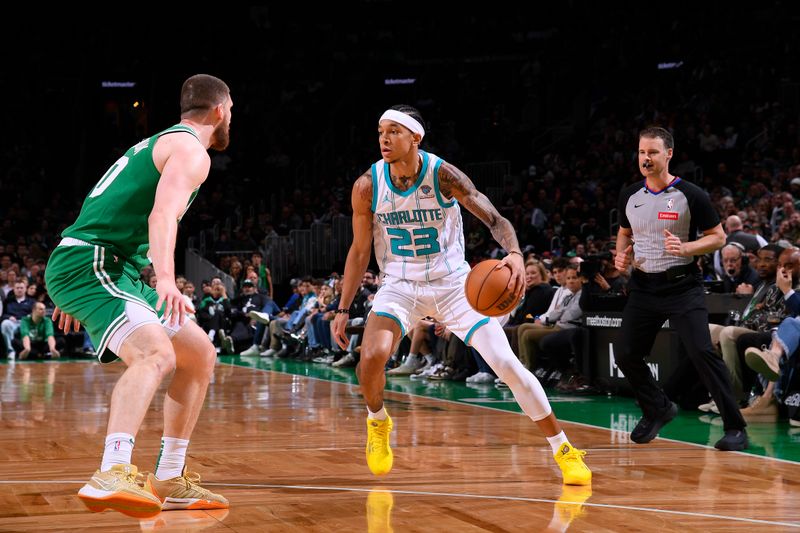 BOSTON, MA - APRIL 12:  Tre Mann #23 of the Charlotte Hornets handles the ball during the game against the Boston Celtics on April 12, 2024 at the TD Garden in Boston, Massachusetts. NOTE TO USER: User expressly acknowledges and agrees that, by downloading and or using this photograph, User is consenting to the terms and conditions of the Getty Images License Agreement. Mandatory Copyright Notice: Copyright 2024 NBAE  (Photo by Brian Babineau/NBAE via Getty Images)