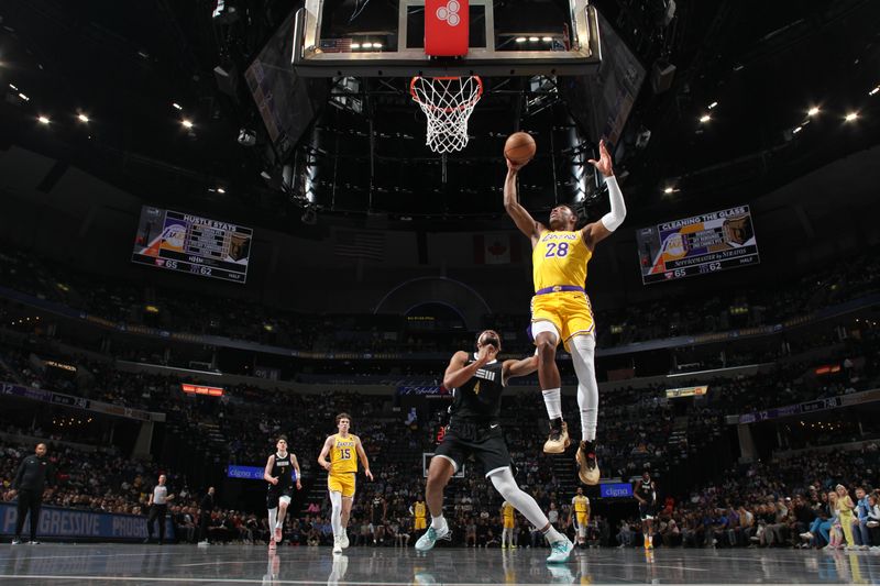 MEMPHIS, TN - APRIL 12: Rui Hachimura #28 of the Los Angeles Lakers drives to the basket during the game against the Memphis Grizzlies on April 12, 2024 at FedExForum in Memphis, Tennessee. NOTE TO USER: User expressly acknowledges and agrees that, by downloading and or using this photograph, User is consenting to the terms and conditions of the Getty Images License Agreement. Mandatory Copyright Notice: Copyright 2024 NBAE (Photo by Joe Murphy/NBAE via Getty Images)