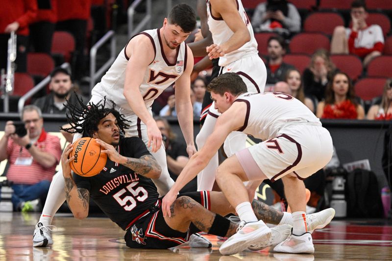 Mar 5, 2024; Louisville, Kentucky, USA; Louisville Cardinals guard Skyy Clark (55) looks to pass under the pressure of Virginia Tech Hokies guard Hunter Cattoor (0) and guard Sean Pedulla (3) during the first half at KFC Yum! Center. Mandatory Credit: Jamie Rhodes-USA TODAY Sports