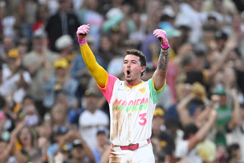 July 5, 2024; San Diego, California, USA; San Diego Padres center fielder Jackson Merrill (3) celebrates after hitting an RBI triple during the fourth inning against the Arizona Diamondbacks at Petco Park. Mandatory Credit: Denis Poroy-USA TODAY Sports