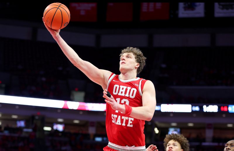 Jan 17, 2026; Columbus, Ohio, USA; Ohio State Buckeyes center Christoph Tilly (13) goes to the basket during the second half against the UCLA Bruins at Value City Arena. Mandatory Credit: Joseph Maiorana-Imagn Images