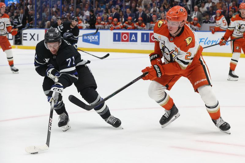 Oct 25, 2025; Tampa, Florida, USA; Tampa Bay Lightning center Anthony Cirelli (71) skates with the puck as Anaheim Ducks defenseman Jackson Lacombe (2) defends during the first period at Benchmark International Arena. Mandatory Credit: Kim Klement Neitzel-Imagn Images