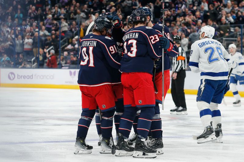 Nov 21, 2024; Columbus, Ohio, USA; Columbus Blue Jackets center Kent Johnson (91) celebrates his goal against the Tampa Bay Lightning during the second period at Nationwide Arena. Mandatory Credit: Russell LaBounty-Imagn Images