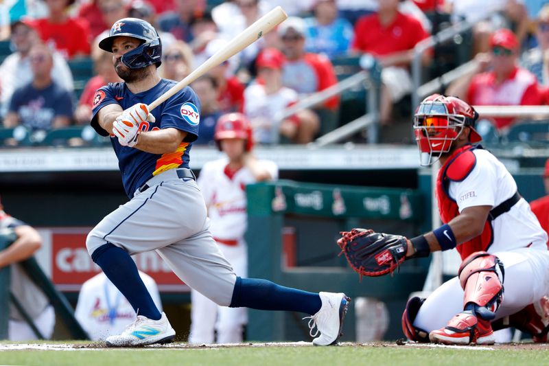 Mar 21, 2024; Jupiter, Florida, USA; Houston Astros second baseman Jose Altuve (27) bats against the St. Louis Cardinals in the first inning at Roger Dean Chevrolet Stadium. Mandatory Credit: Rhona Wise-USA TODAY Sports