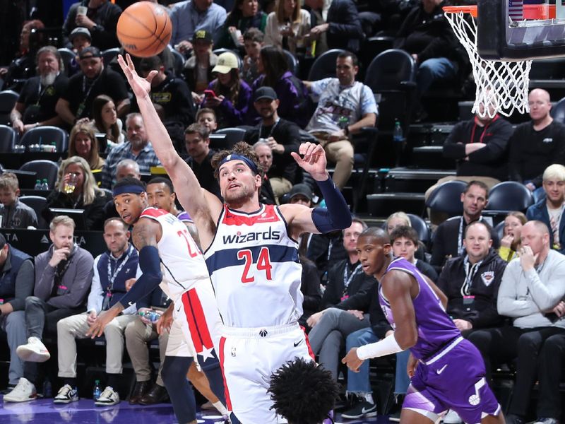 SALT LAKE CITY, UT - MARCH 4:  Corey Kispert #24 of the Washington Wizards grabs a rebound during the game against the Utah Jazz on March 4, 2024 at vivint.SmartHome Arena in Salt Lake City, Utah. NOTE TO USER: User expressly acknowledges and agrees that, by downloading and or using this Photograph, User is consenting to the terms and conditions of the Getty Images License Agreement. Mandatory Copyright Notice: Copyright 2024 NBAE (Photo by Melissa Majchrzak/NBAE via Getty Images)