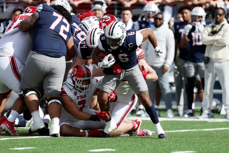 Nov 18, 2023; Tucson, Arizona, USA; Arizona Wildcats running back Michael Wiley (6) runs the ball against the Utah Utes during the second half at Arizona Stadium. Mandatory Credit: Zachary BonDurant-USA TODAY Sports