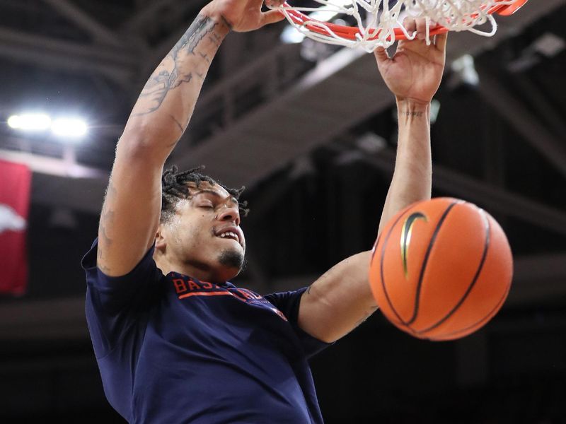 Jan 6, 2024; Fayetteville, Arkansas, USA; Auburn Tigers forward Addarin Scott (23) warms up prior to the game against the Arkansas Razorbacks at Bud Walton Arena. Mandatory Credit: Nelson Chenault-USA TODAY Sports