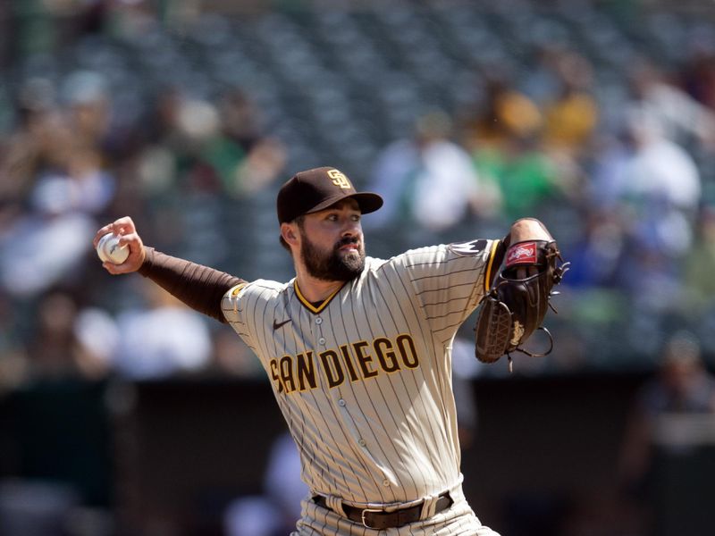 Sep 16, 2023; Oakland, California, USA; San Diego Padres starting pitcher Matt Waldron (61) pitches against the Oakland Athletics during the second inning at Oakland-Alameda County Coliseum. Mandatory Credit: D. Ross Cameron-USA TODAY Sports