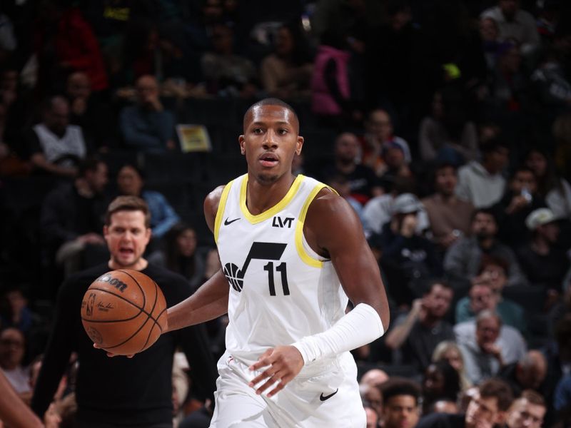 BROOKLYN, NY - JANUARY 29: Kris Dunn #11 of the Utah Jazz dribbles the ball during the game against the Brooklyn Nets on January 29, 2024 at Barclays Center in Brooklyn, New York. NOTE TO USER: User expressly acknowledges and agrees that, by downloading and or using this Photograph, user is consenting to the terms and conditions of the Getty Images License Agreement. Mandatory Copyright Notice: Copyright 2024 NBAE (Photo by Nathaniel S. Butler/NBAE via Getty Images)