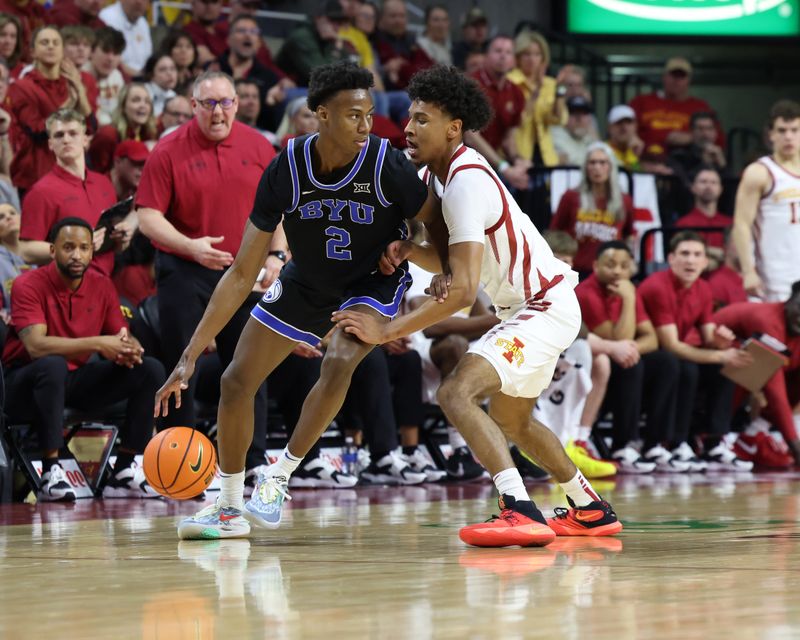 Mar 6, 2024; Ames, Iowa, USA; Iowa State Cyclones guard Curtis Jones (5) defends Brigham Young Cougars guard Jaxson Robinson (2) at James H. Hilton Coliseum. Mandatory Credit: Reese Strickland-USA TODAY Sports

