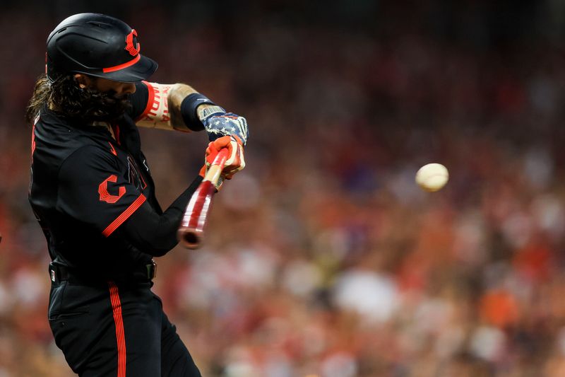 Jul 5, 2024; Cincinnati, Ohio, USA; Cincinnati Reds second baseman Jonathan India (6) hits a single against the Detroit Tigers in the sixth inning at Great American Ball Park. Mandatory Credit: Katie Stratman-USA TODAY Sports