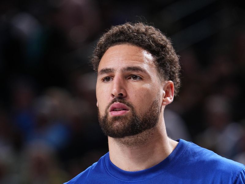 DALLAS, TX - MARCH 13: Klay Thompson #11 of the Golden State Warriors warms up before the game against the Dallas Mavericks on March 13, 2024 at the American Airlines Center in Dallas, Texas. NOTE TO USER: User expressly acknowledges and agrees that, by downloading and or using this photograph, User is consenting to the terms and conditions of the Getty Images License Agreement. Mandatory Copyright Notice: Copyright 2024 NBAE (Photo by Glenn James/NBAE via Getty Images)