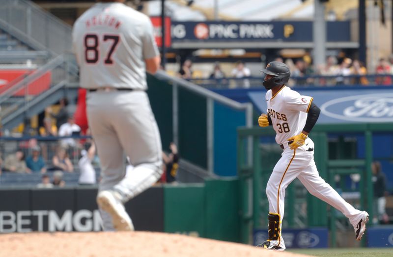 Apr 9, 2024; Pittsburgh, Pennsylvania, USA;  Pittsburgh Pirates right fielder Edward Olivares (38) circles the bases after hitting a solo home run against Detroit Tigers relief pitcher Tyler Holton (87) during the sixth inning at PNC Park. Mandatory Credit: Charles LeClaire-USA TODAY Sports